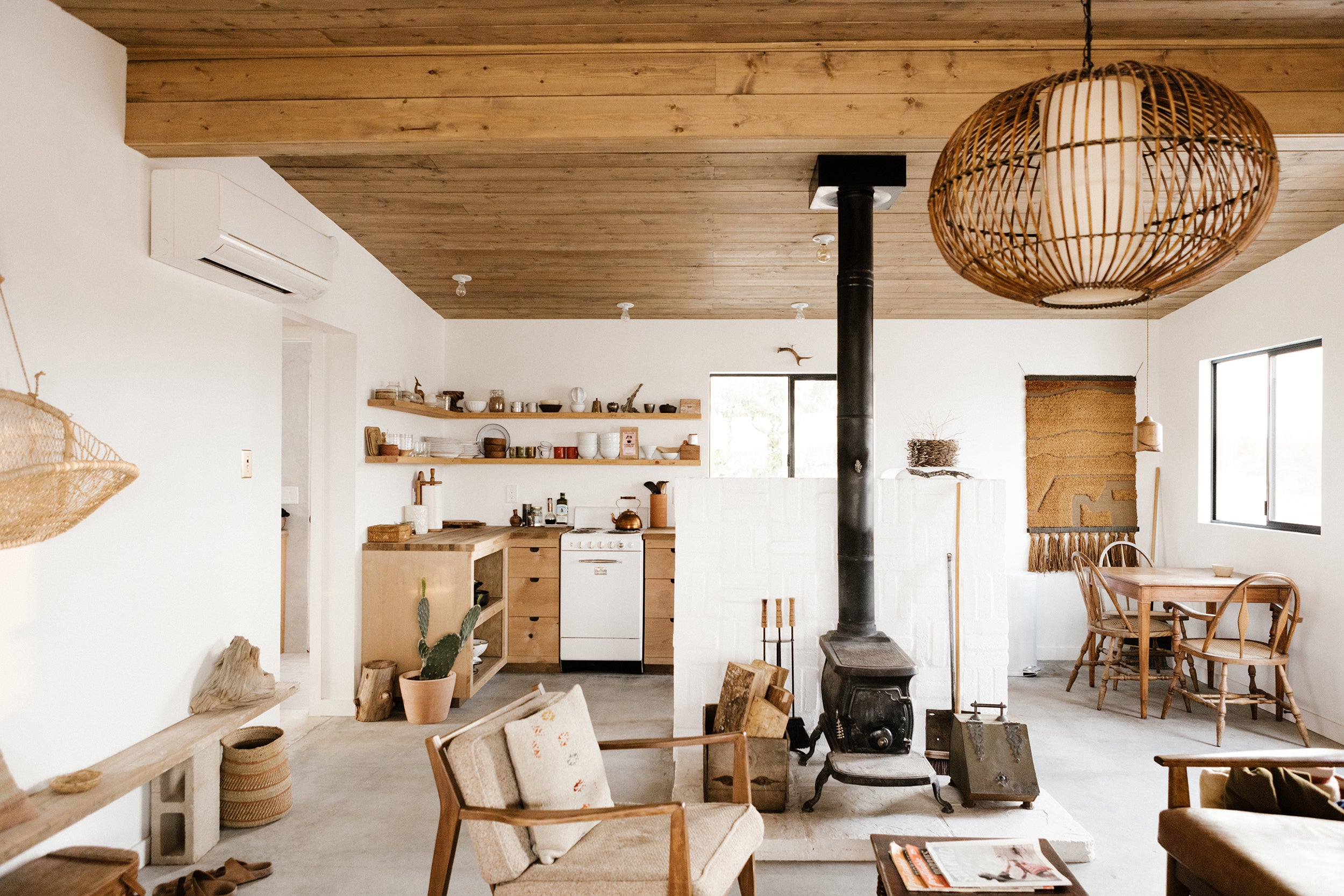 Living room and kitchen at Little Jo Cabin by Campover in Joshua Tree, CA