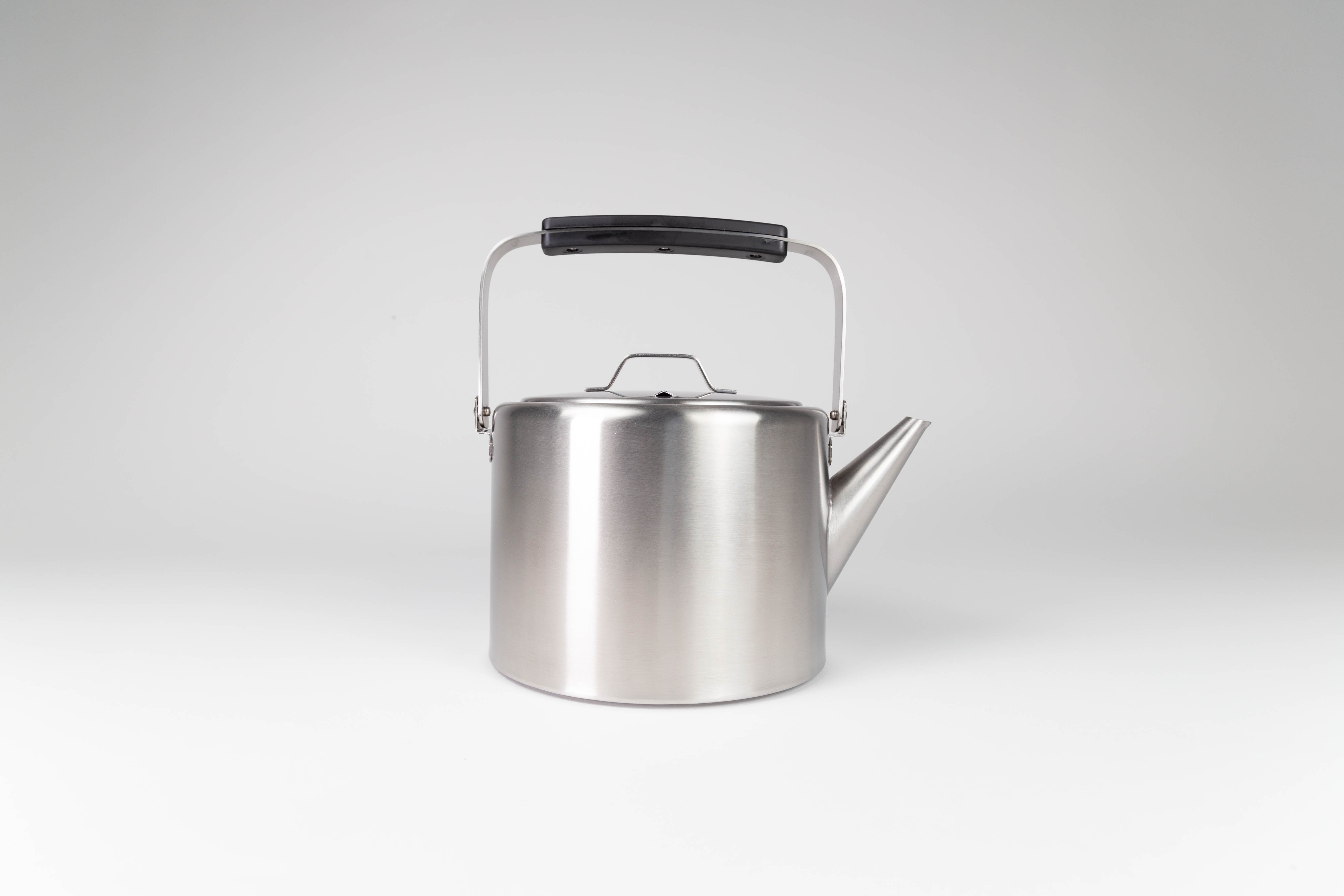 Aizawa Straight Kettle by Kobo Aizawa shown from side angle on white background