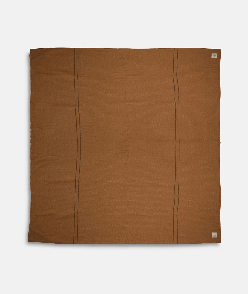 Coming Home Blanket by Pony Rider flat lay on white background