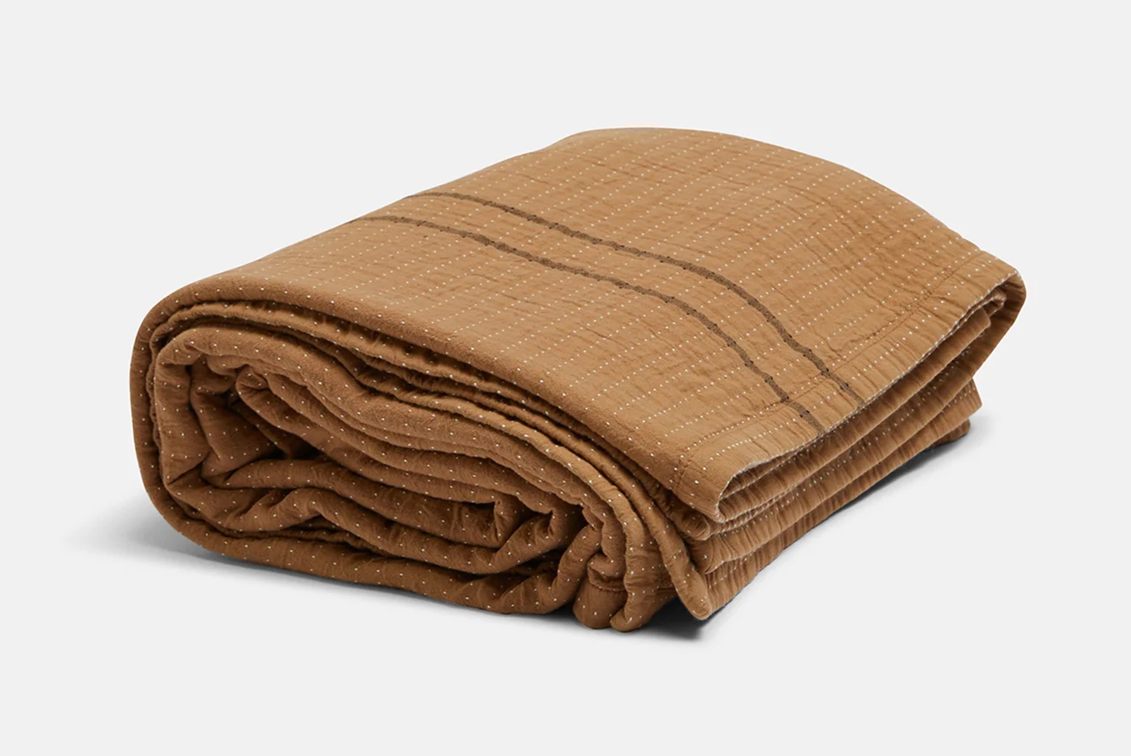 Coming Home Blanket by Pony Rider folded on white background