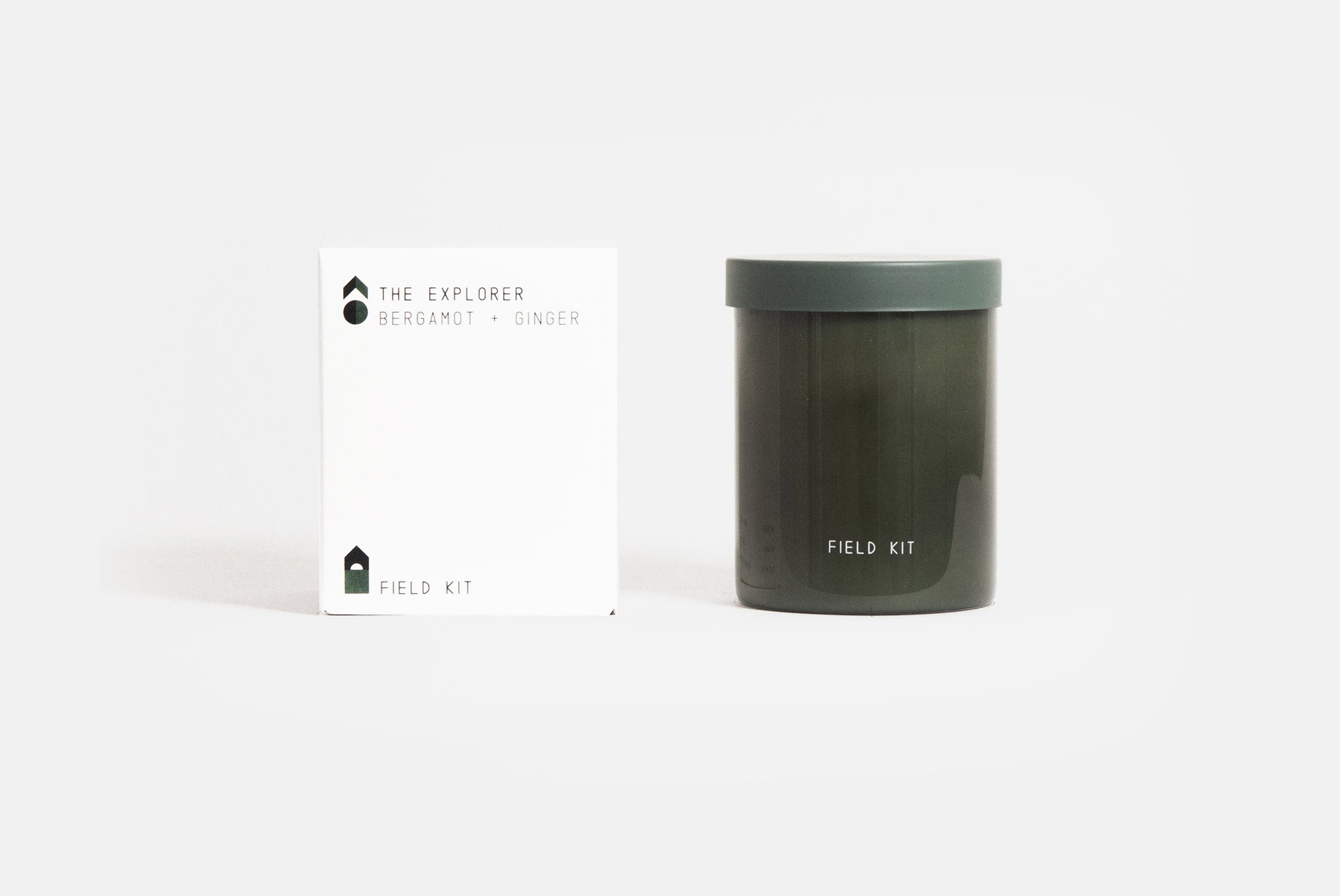 Field Kit Explorer Candle in bergamot + ginger scent shown with box on white background