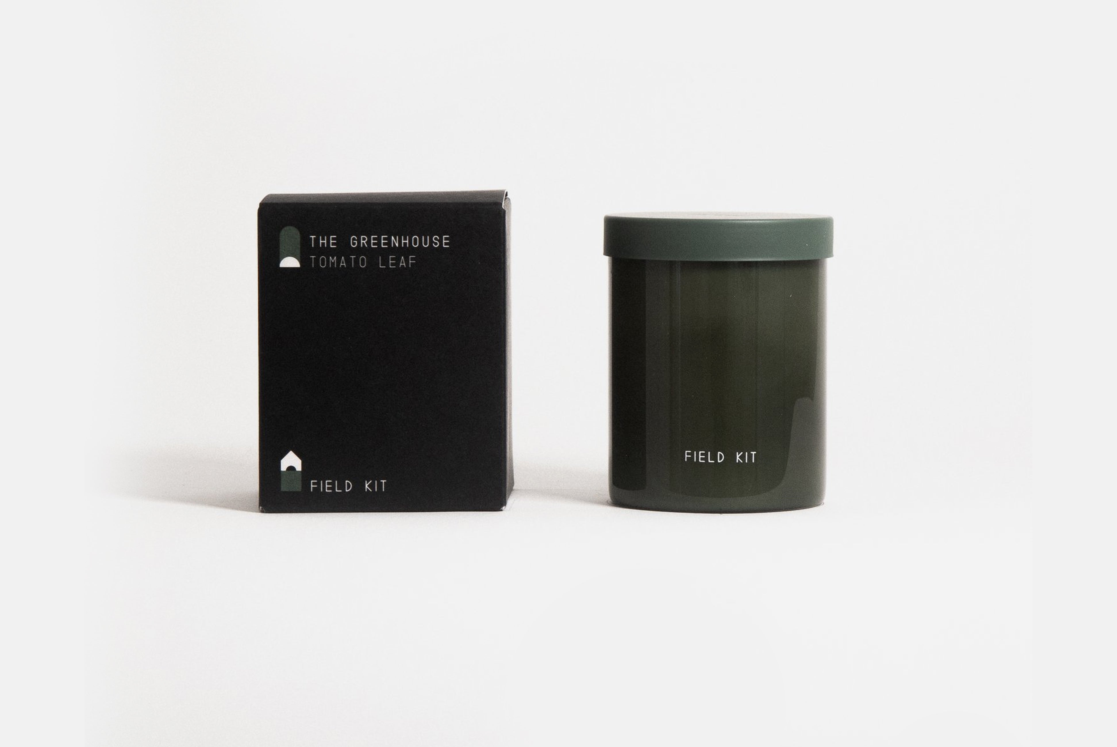 Field Kit The Greenhouse Candle in tomato leaf scent shown with box on white background