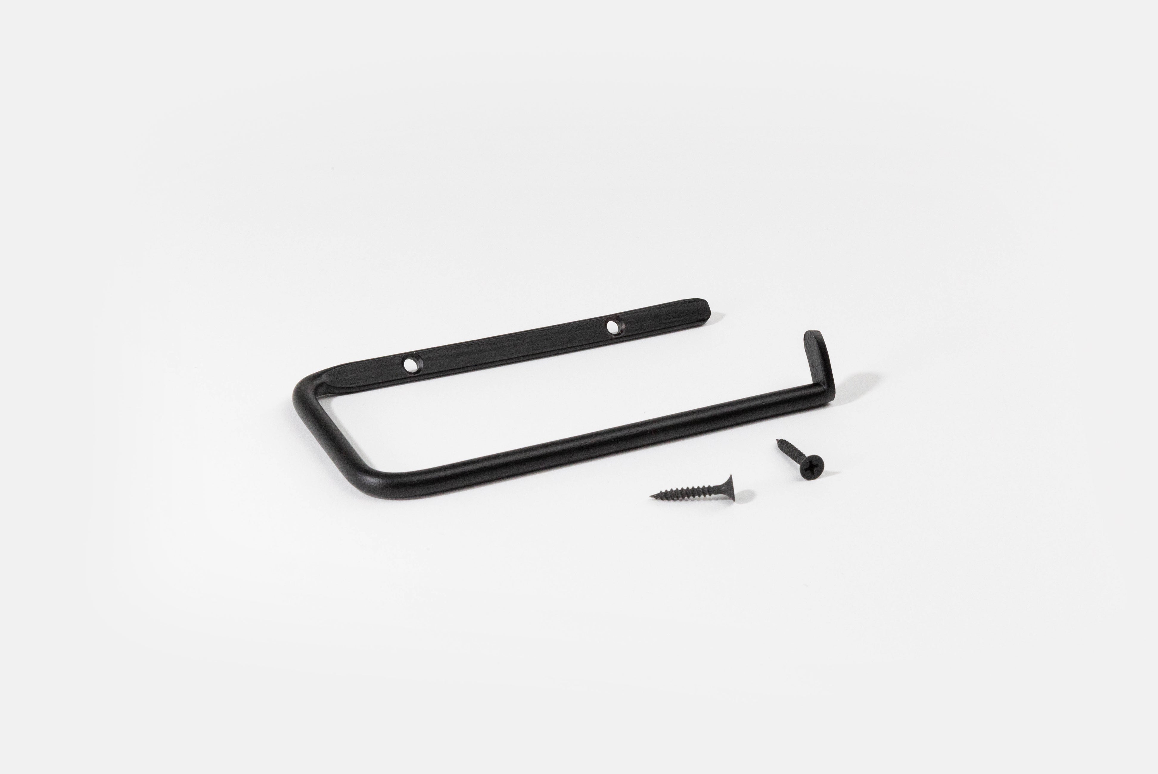 Fog Linen Iron Toilet Paper Holder in black shown unmounted with screws on white background