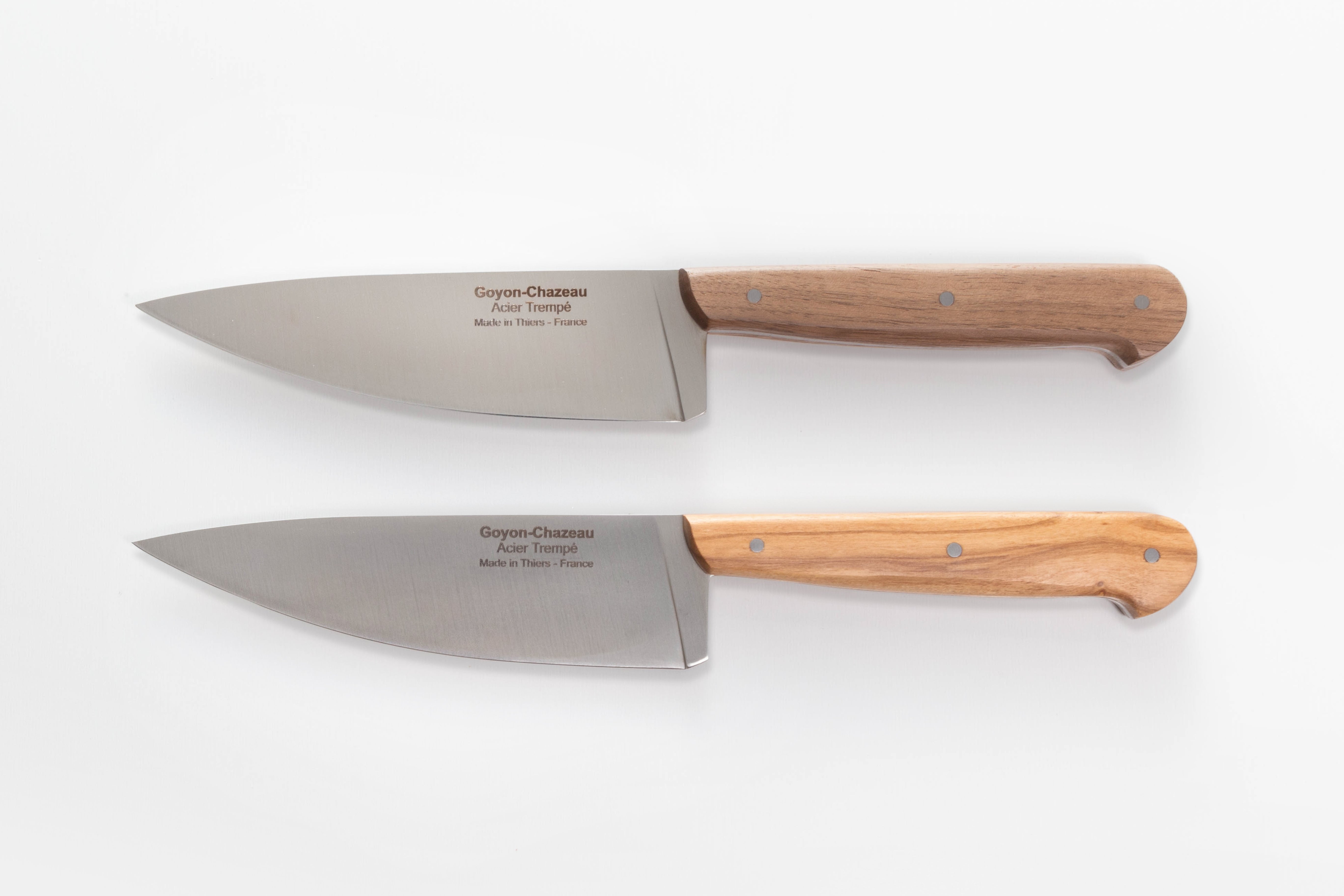 Goyon-Chazeau French Chefs Knife in Walnut and Olive wood on white background