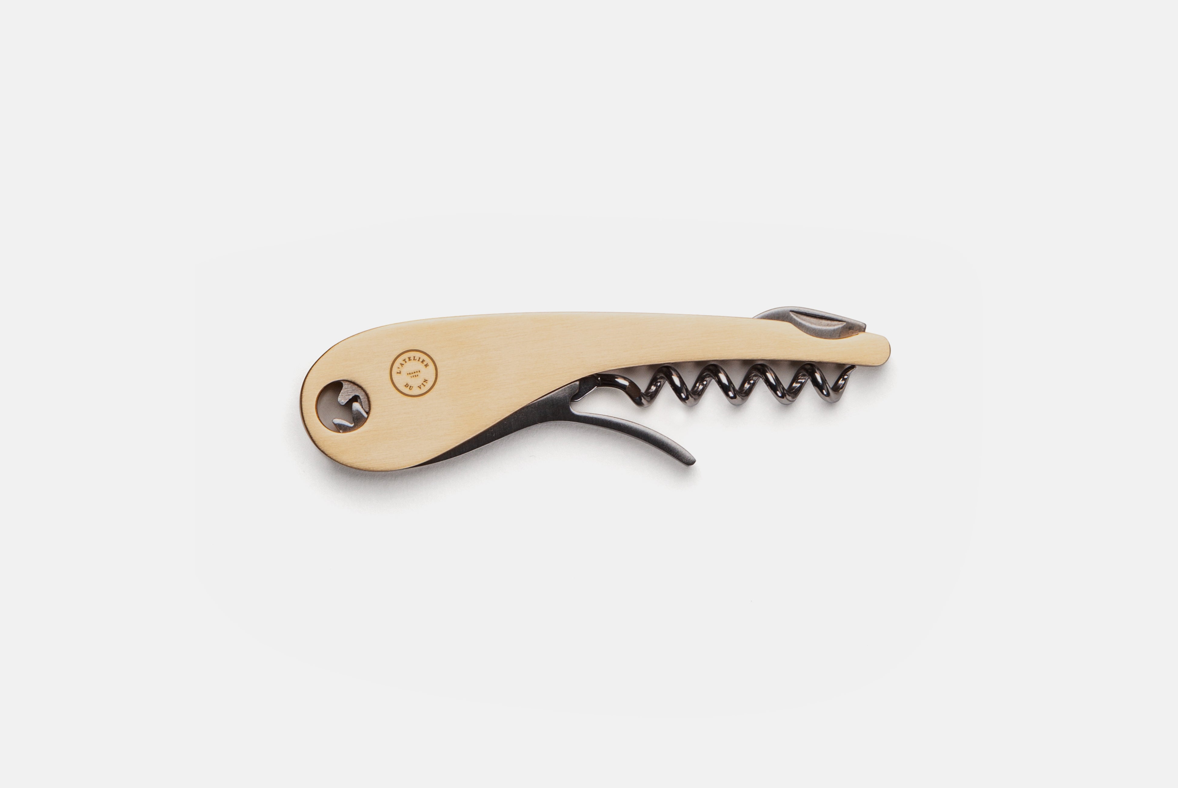 L’Atelier du Vin brass wine opener shown on white background
