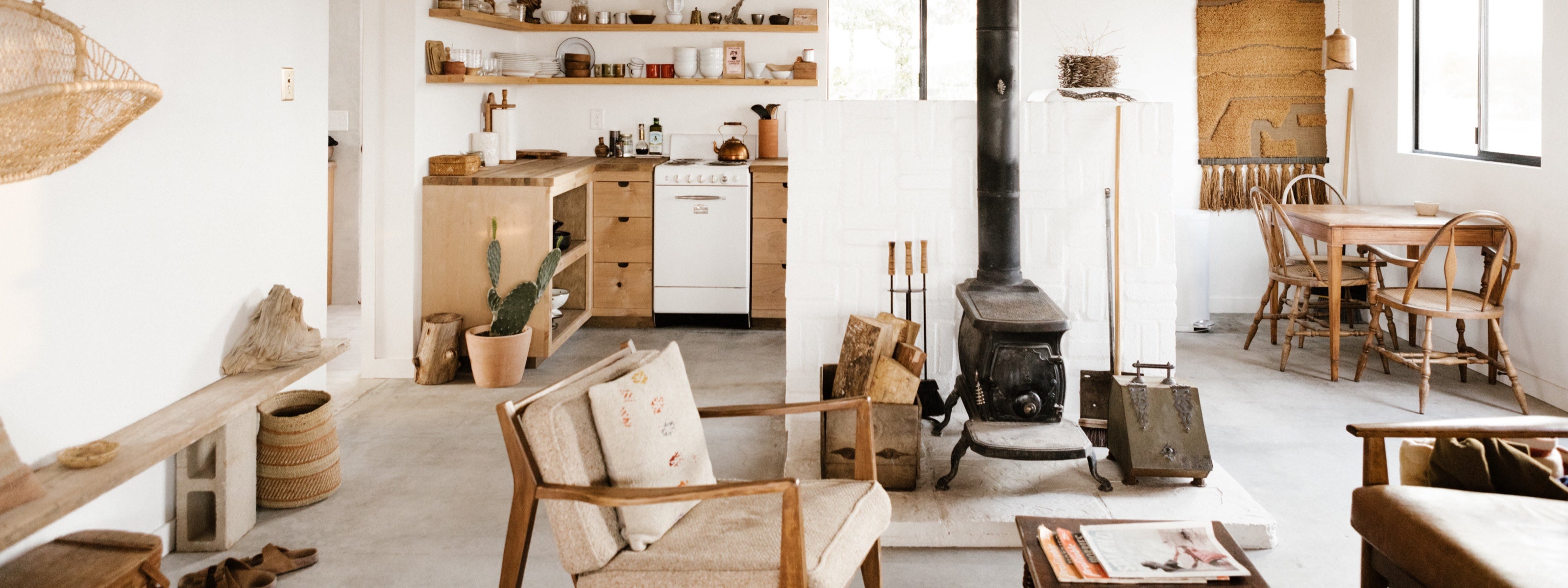 Living room and kitchen at Little Jo Cabin by Campover in Joshua Tree, California
