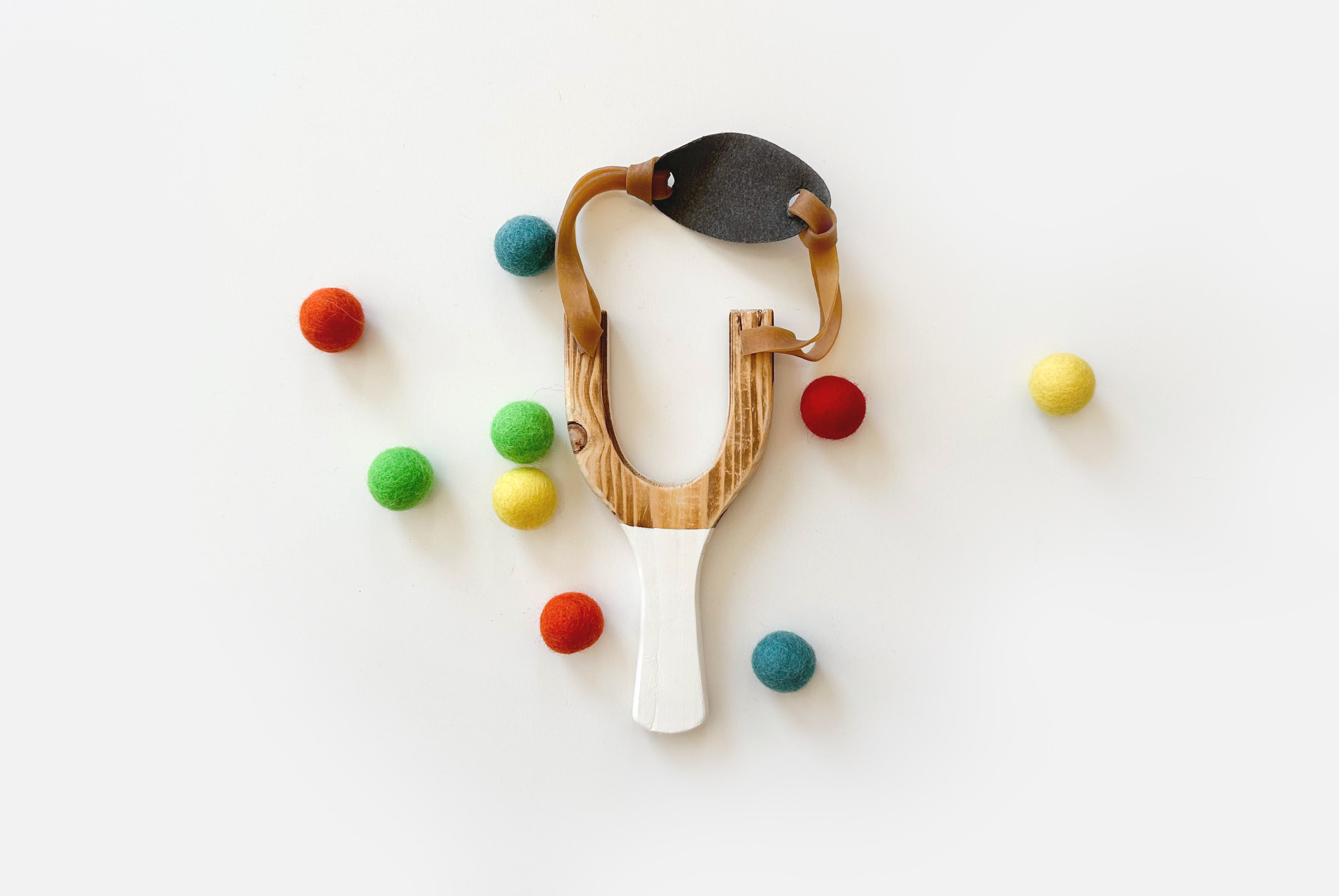 Classic Wooden Slingshot, Rainbow Felt Balls