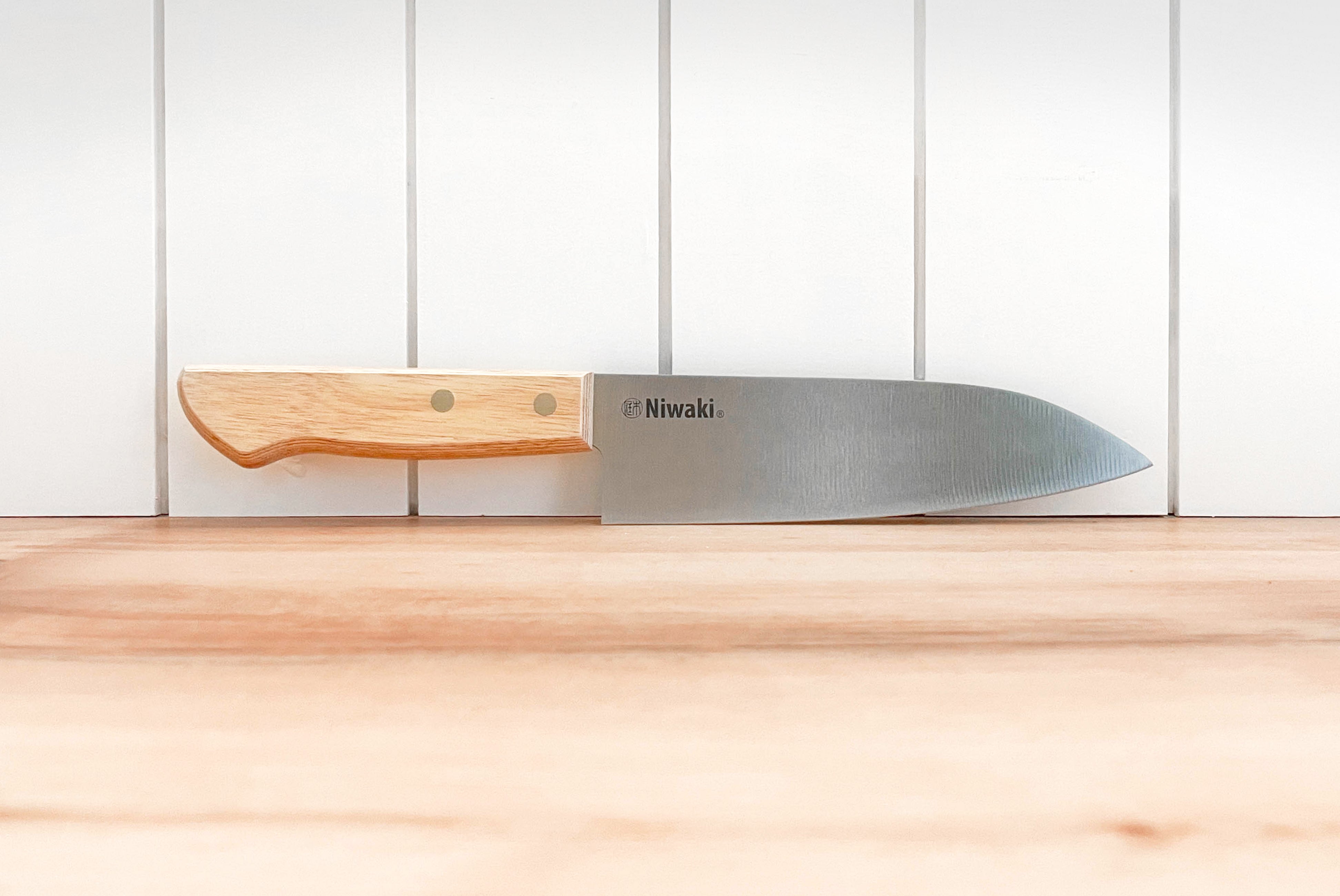 Niwaki Chef's Knife set on countertop | product detail