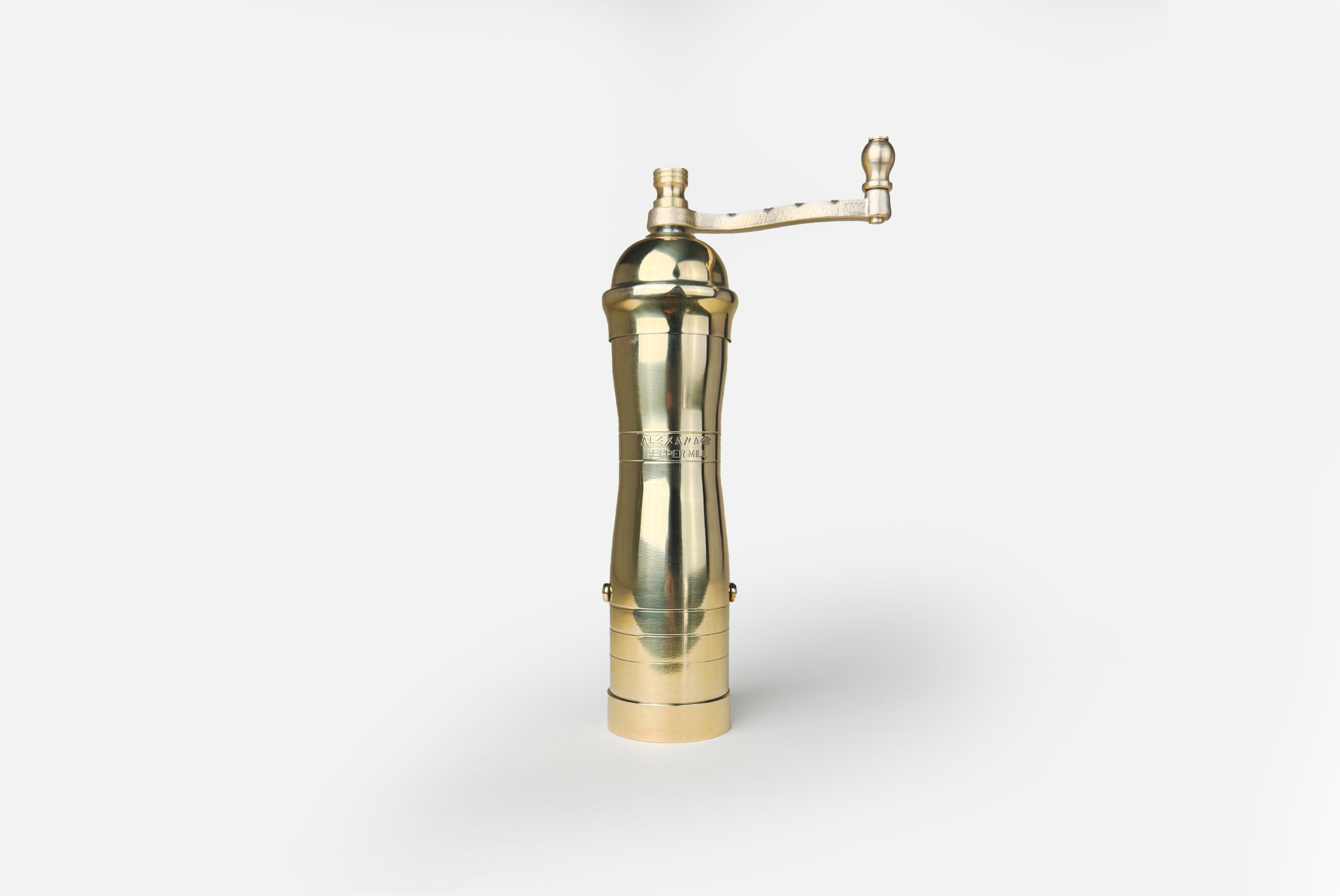 Athena Brass Pepper Mill on white background