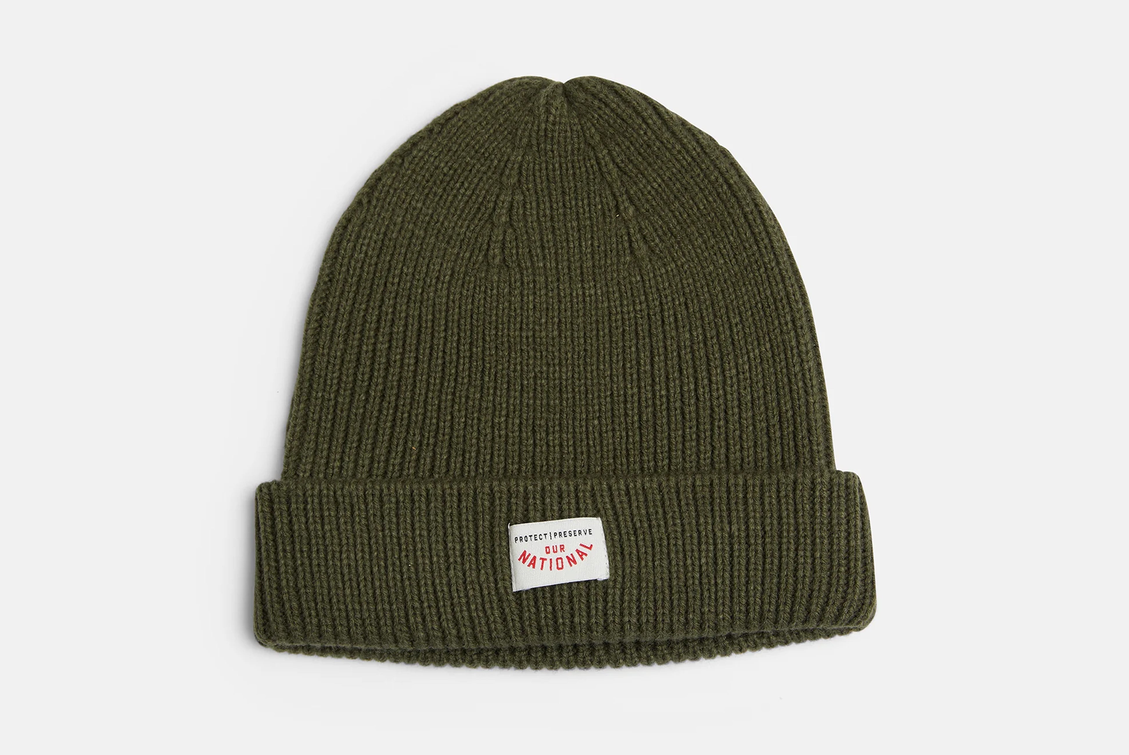 Racer Knit beanie by Pony Rider in green color shown laying flat on white background