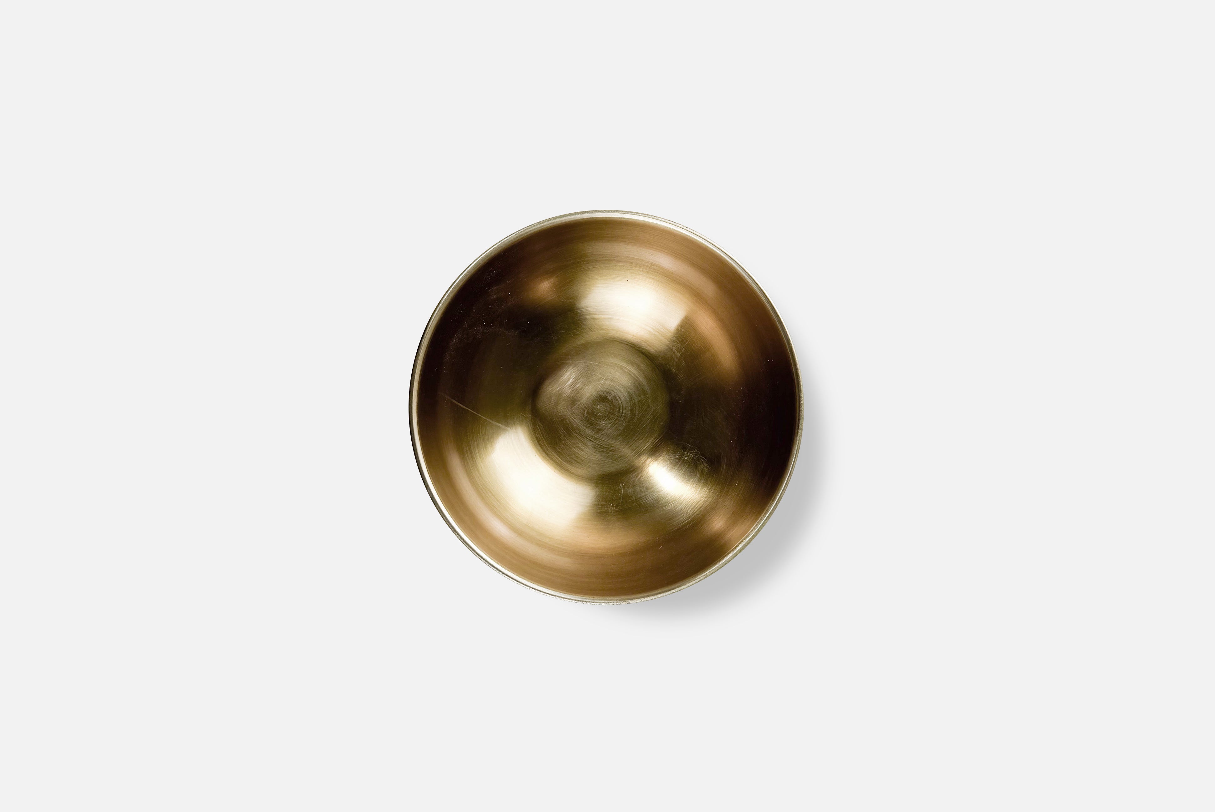 Inside of Fog Linen Brass Bowl on white background