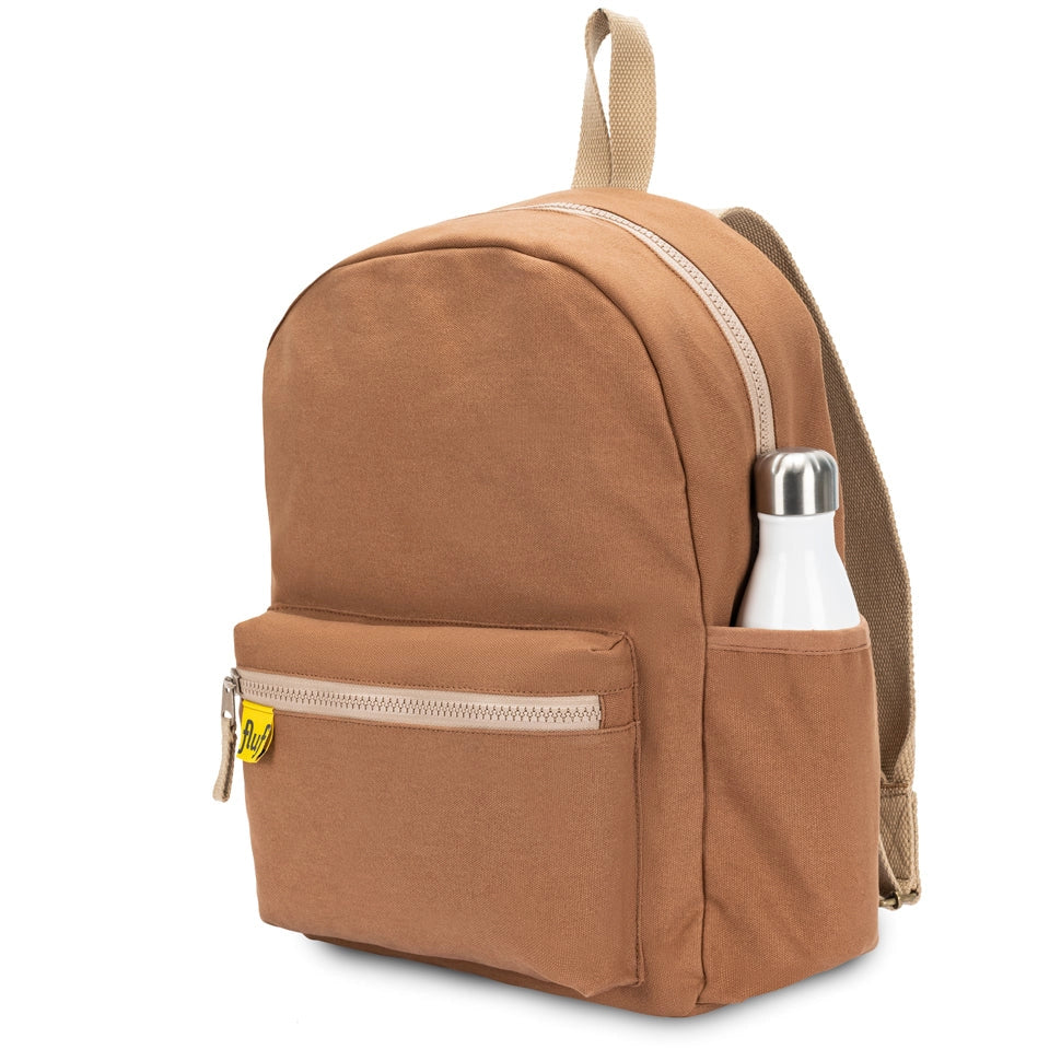 Fluf Organic B Pack Backpack shown in Nutmeg from side angle with water bottle