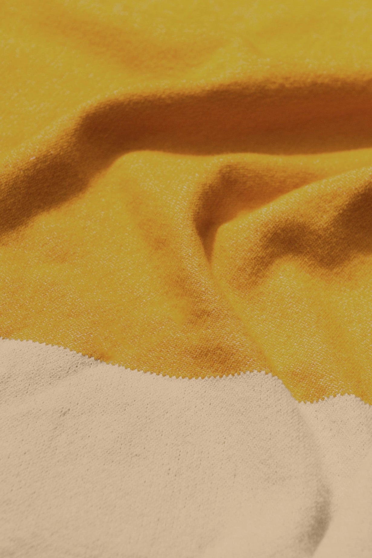 Close up of fabric of Aspen Throw Blanket in mustard color