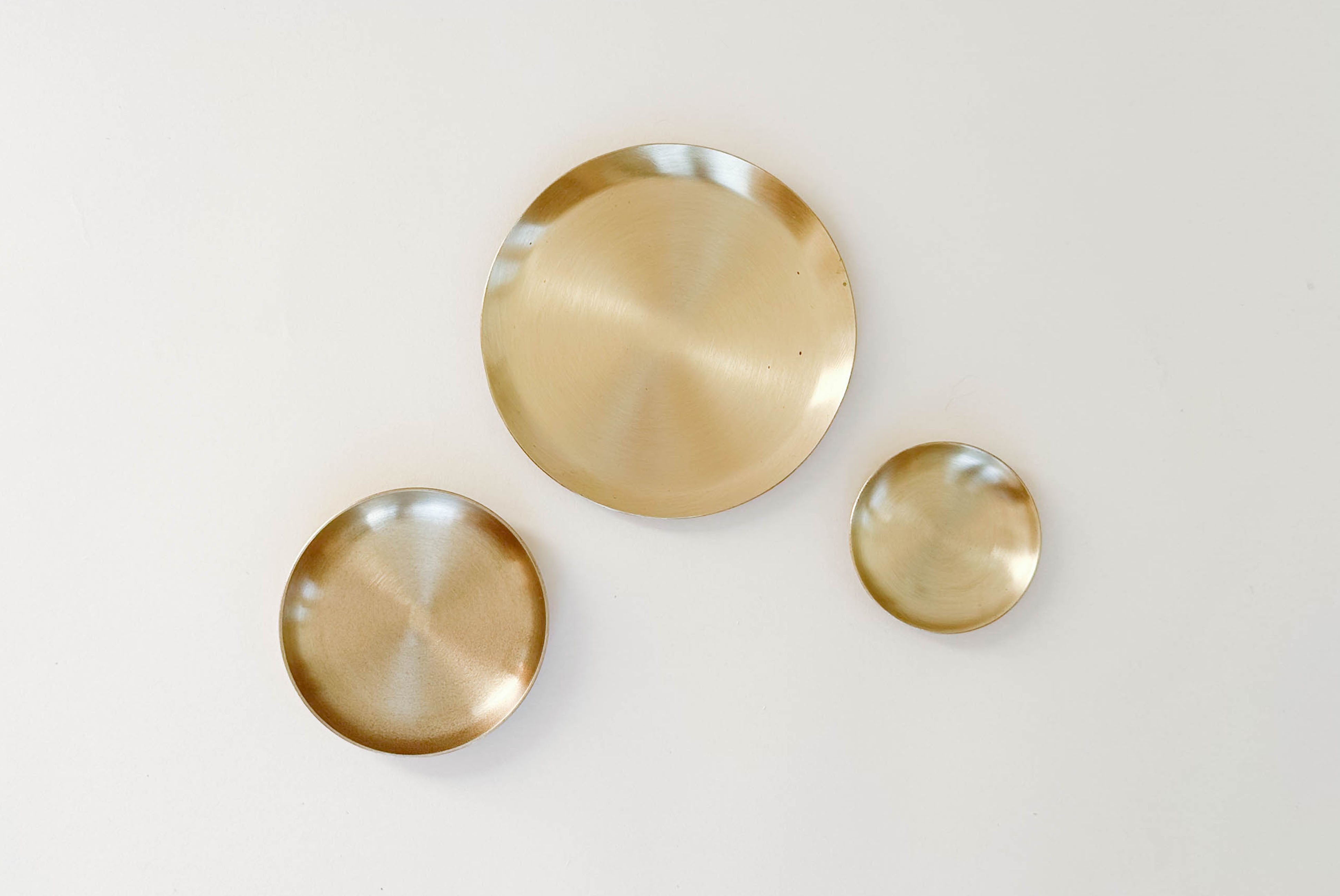 Fog Linen Brass Plate shown in three sizes | product detail
