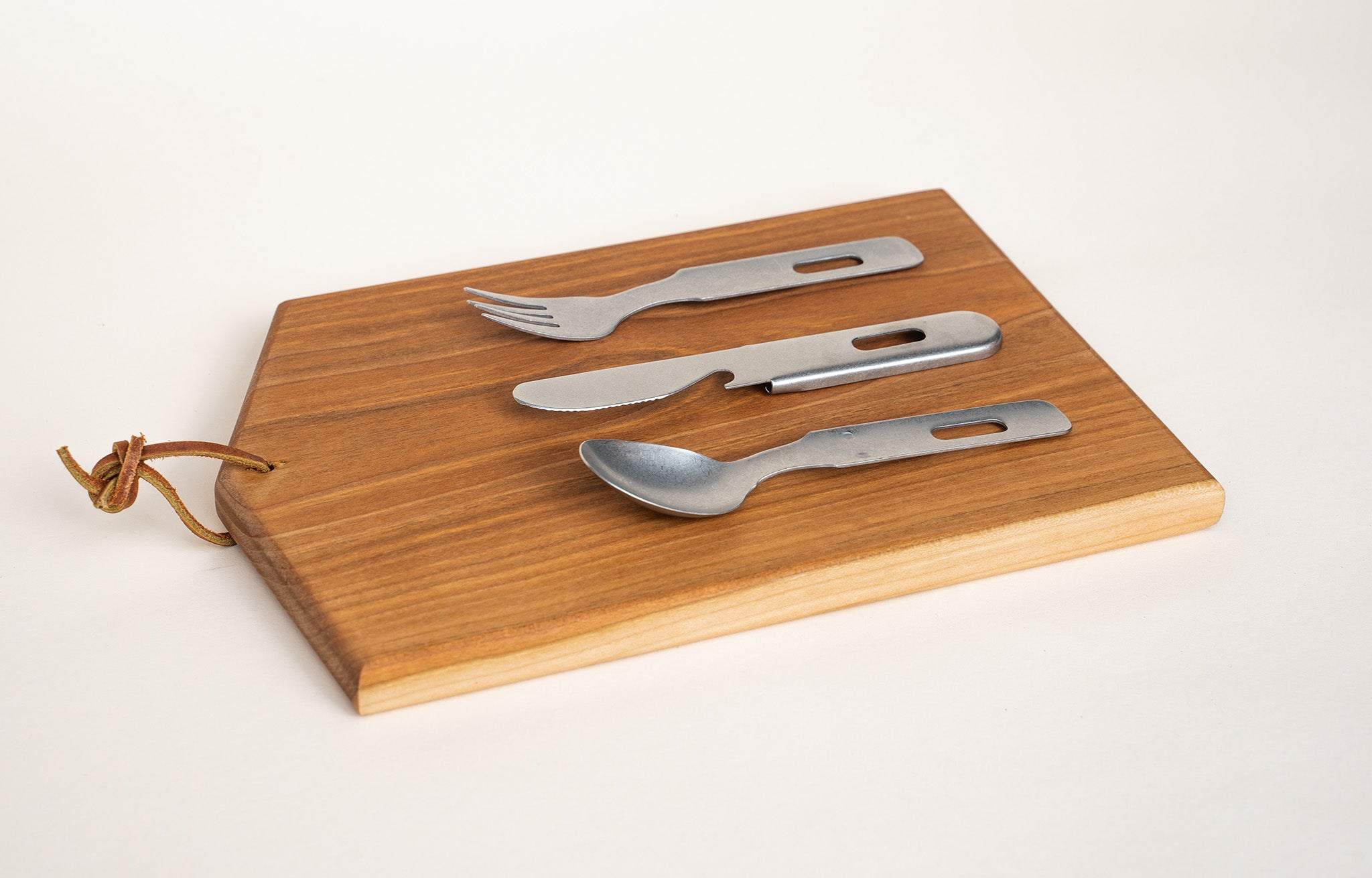 Interlocking Utensil Set shown on wood Campover Asymmetric cutting board