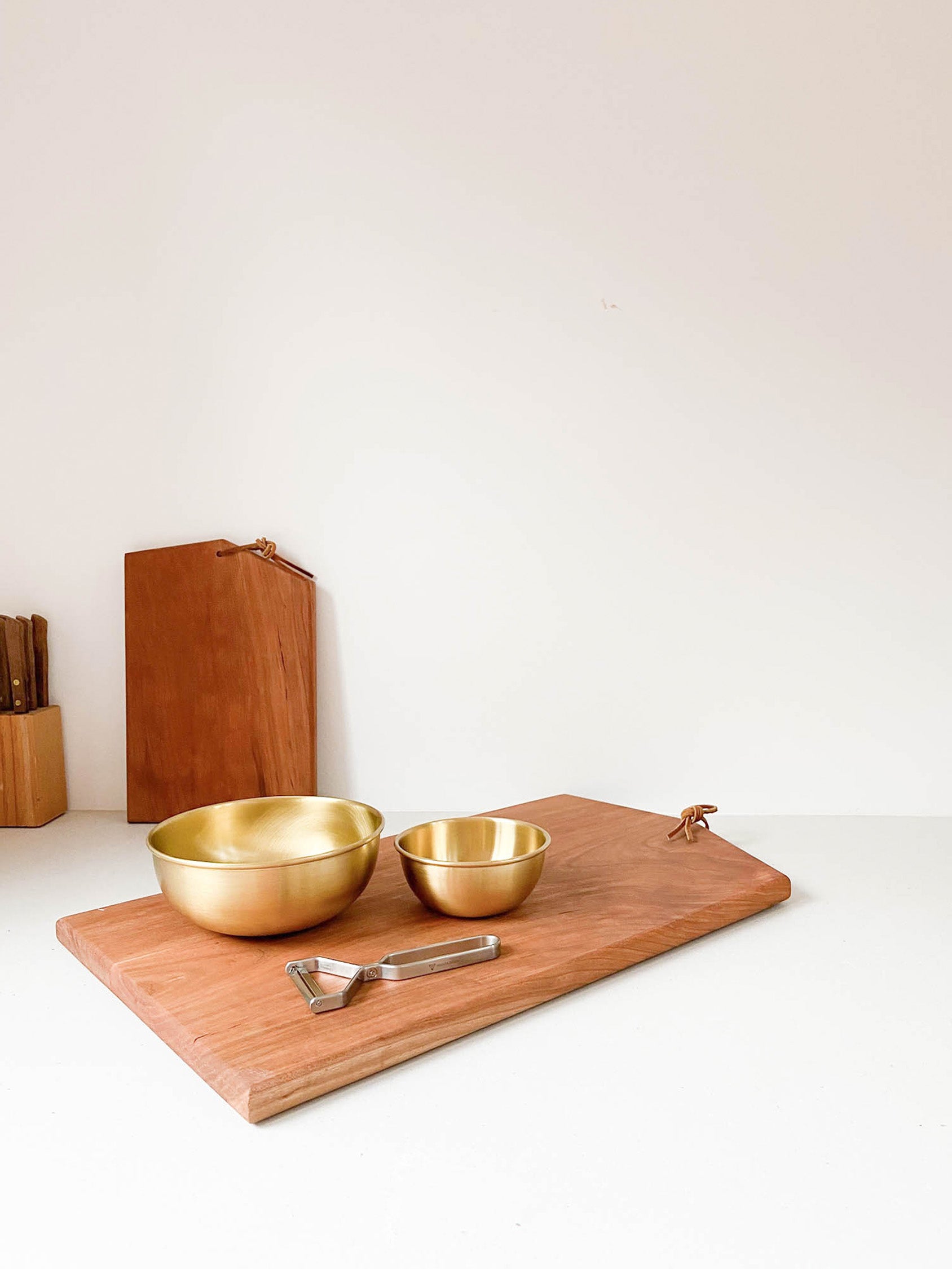Fog Linen Brass Bowls shown on cutting board in Venice Beach kitchen