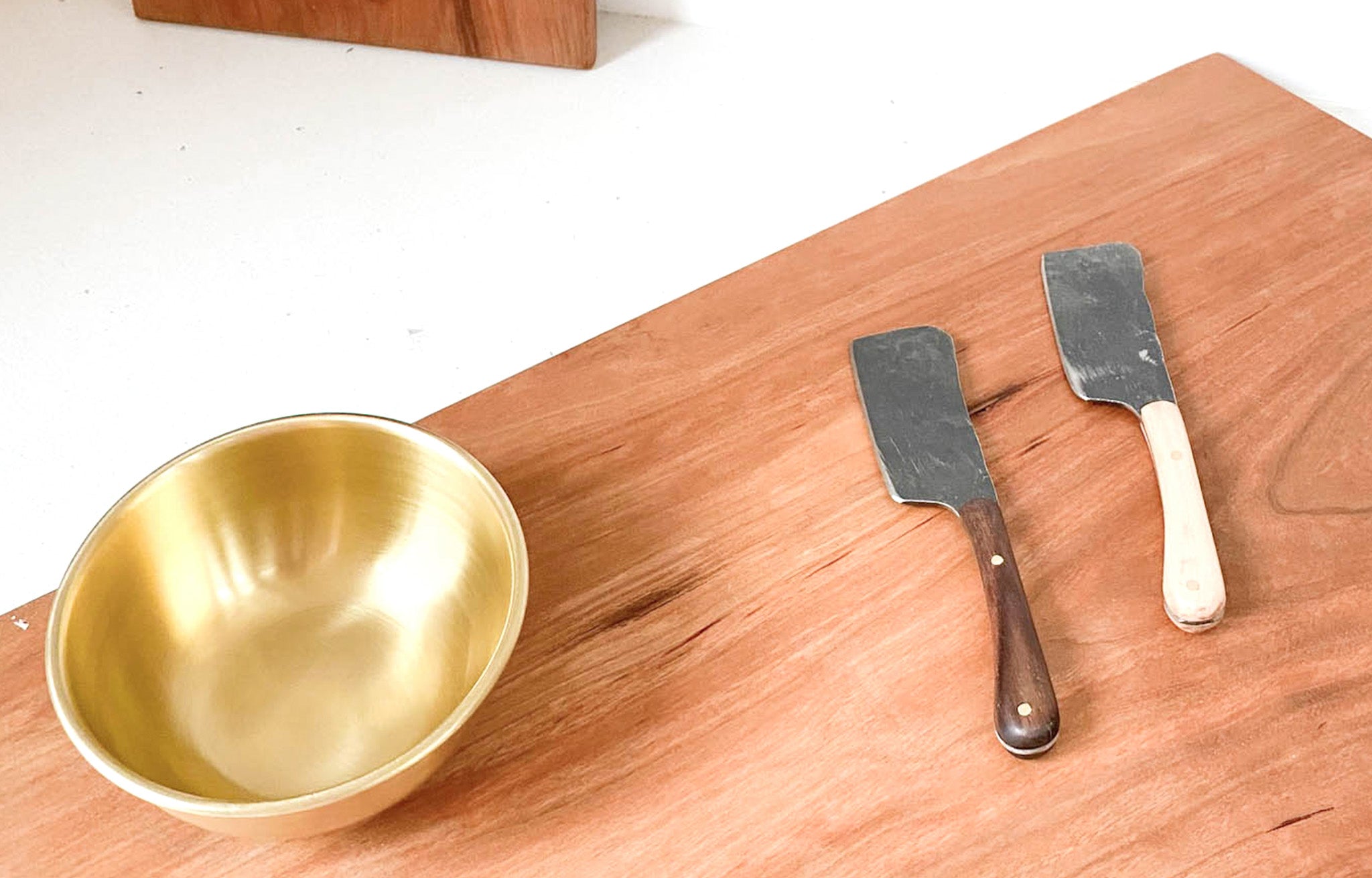 Fog Linen Brass Bowl shown on serving board