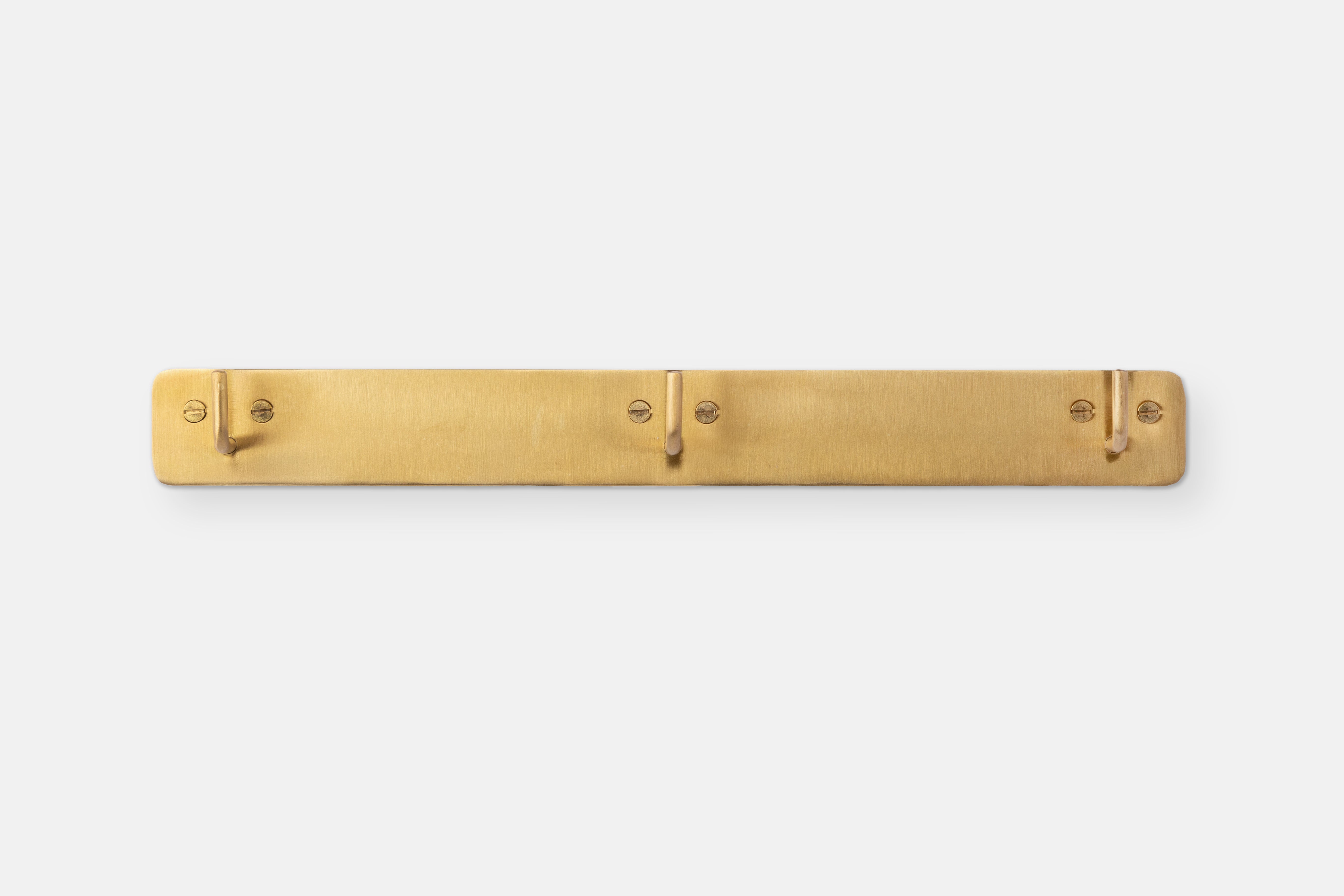 Brass Triple Hook rack by Fog Linen, shown on a white background