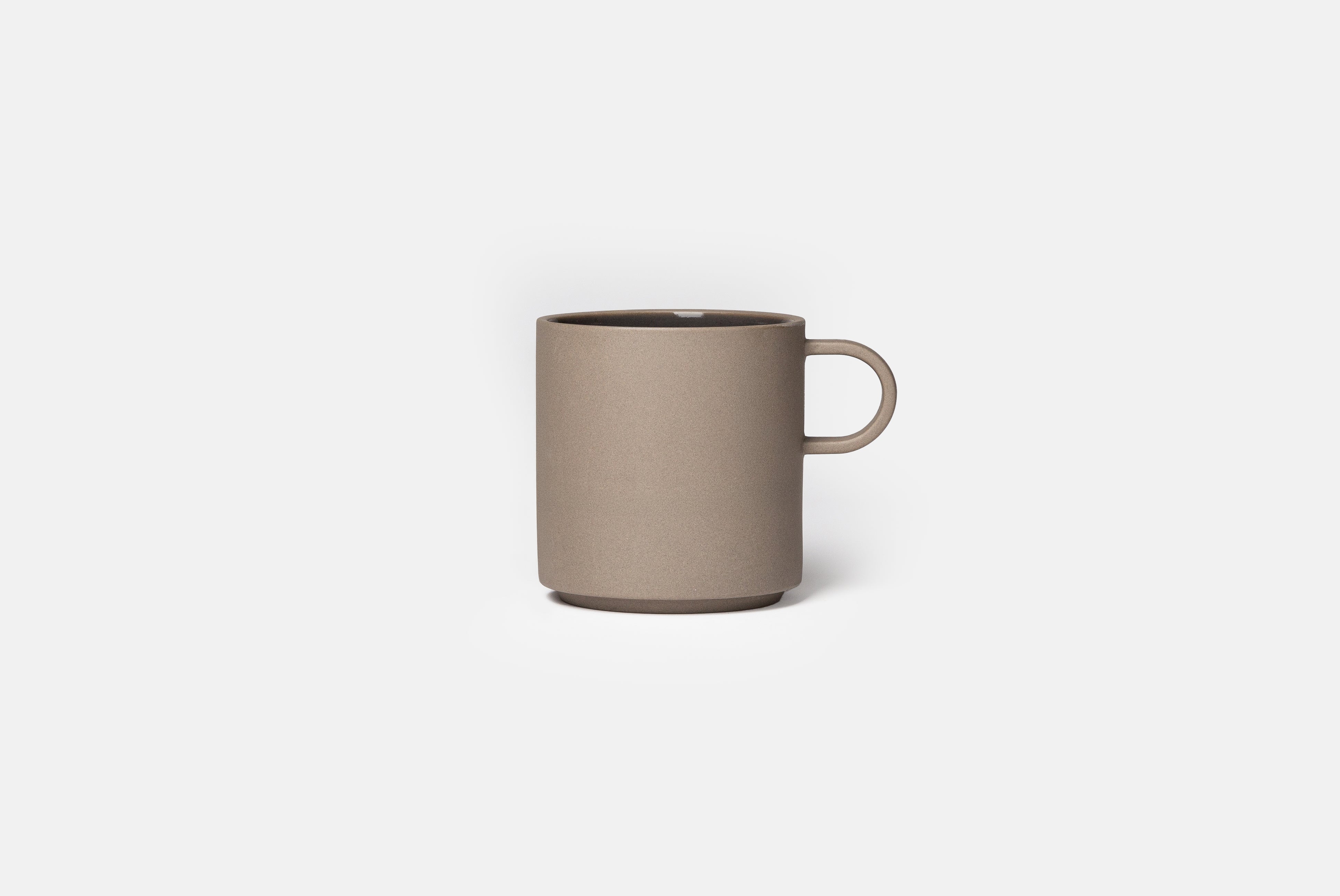 Hasami Porcelain Grey Collection Mug size medium with gray interior on white background. Grey ceramic porcelain mug with round handle.