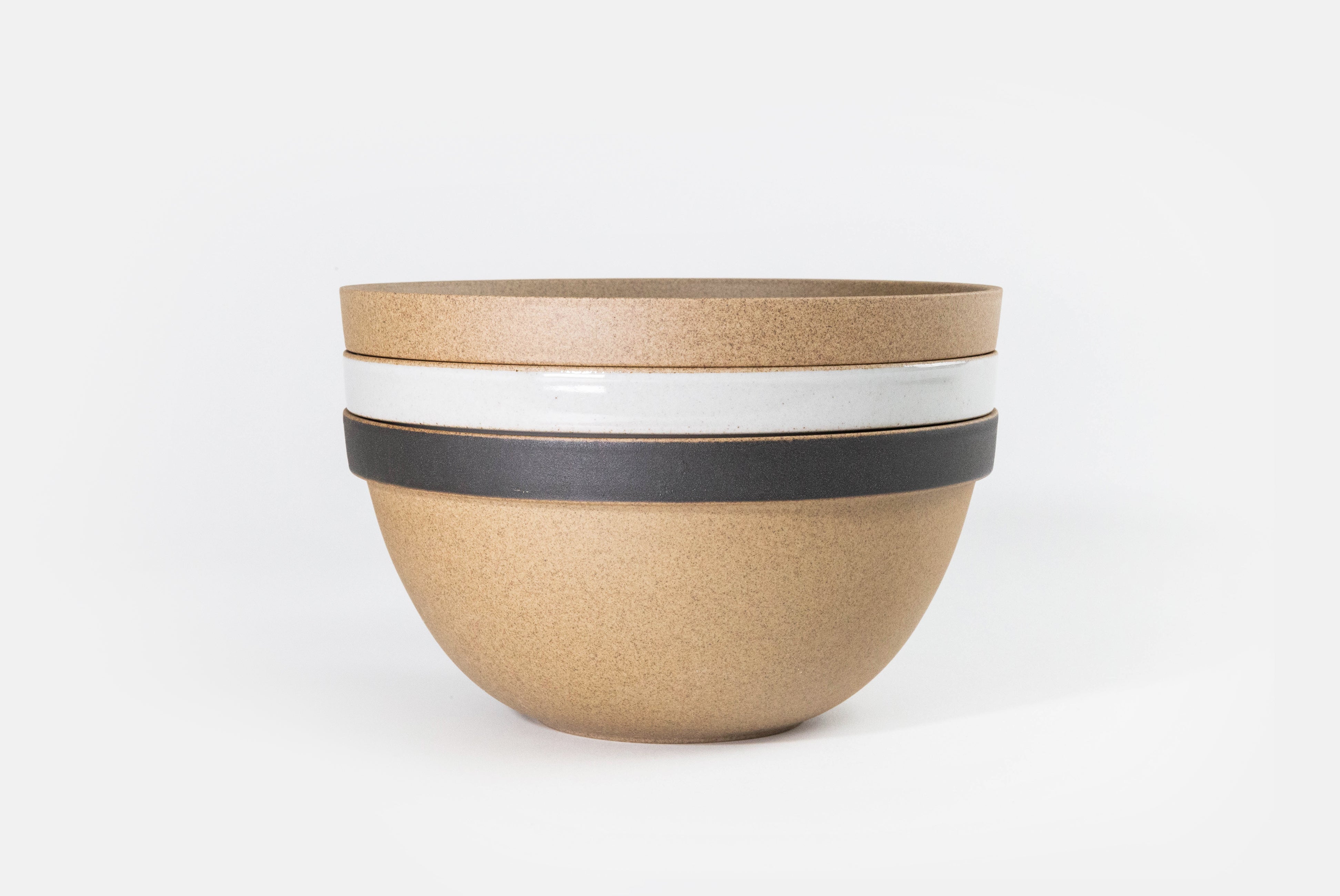 Hasami Porcelain Round Bowl in gloss gray, natural, and natural with matte black in a stack of three on white background