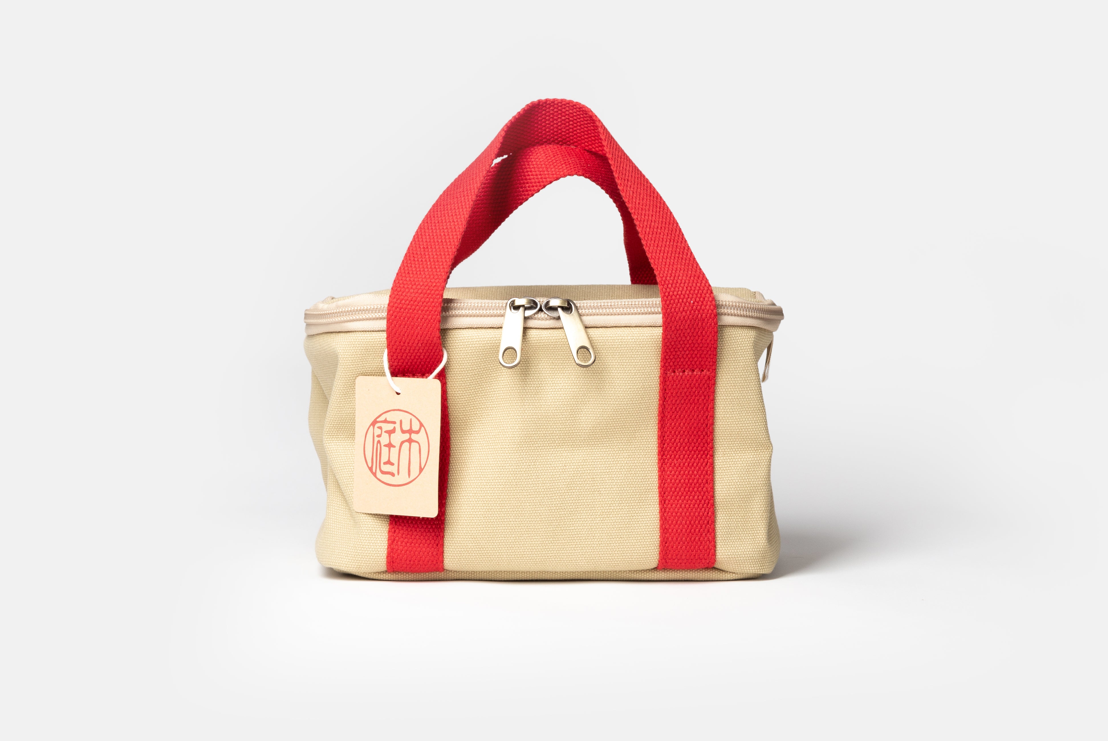 Niwaki Insulated Lunch Bag with red handles, shown from front on white background