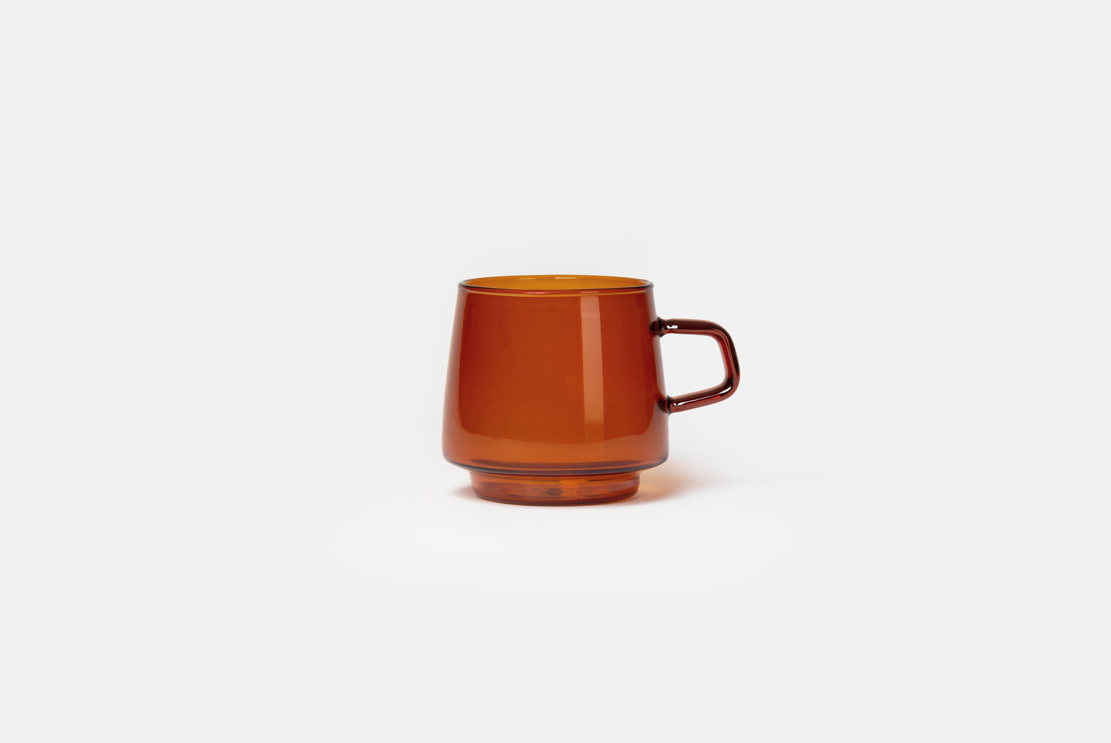 Sepia Mug by Kinto Japan, shown in Amber color on white background