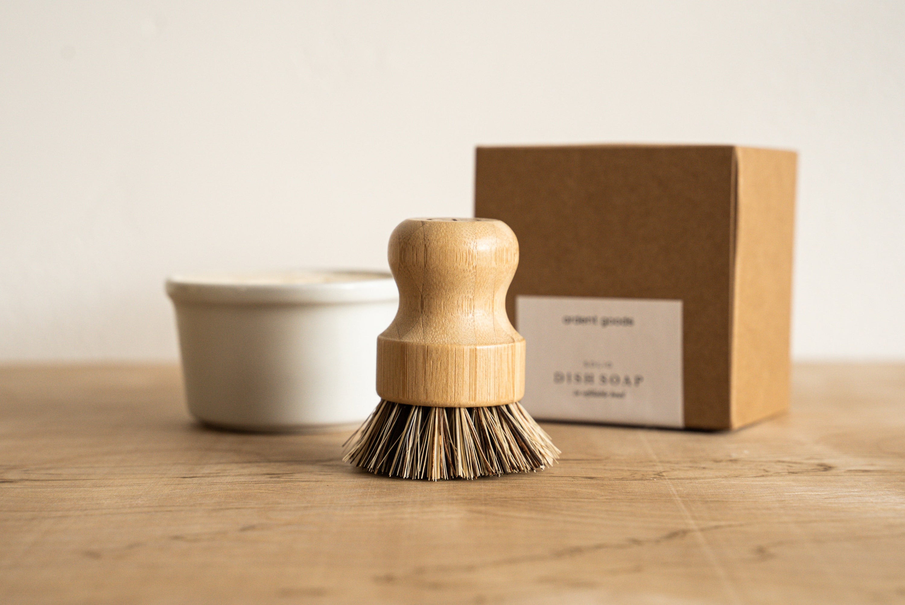 Sisal and Palm Pot Scrubber shown with Solid Dish Soap and packaging