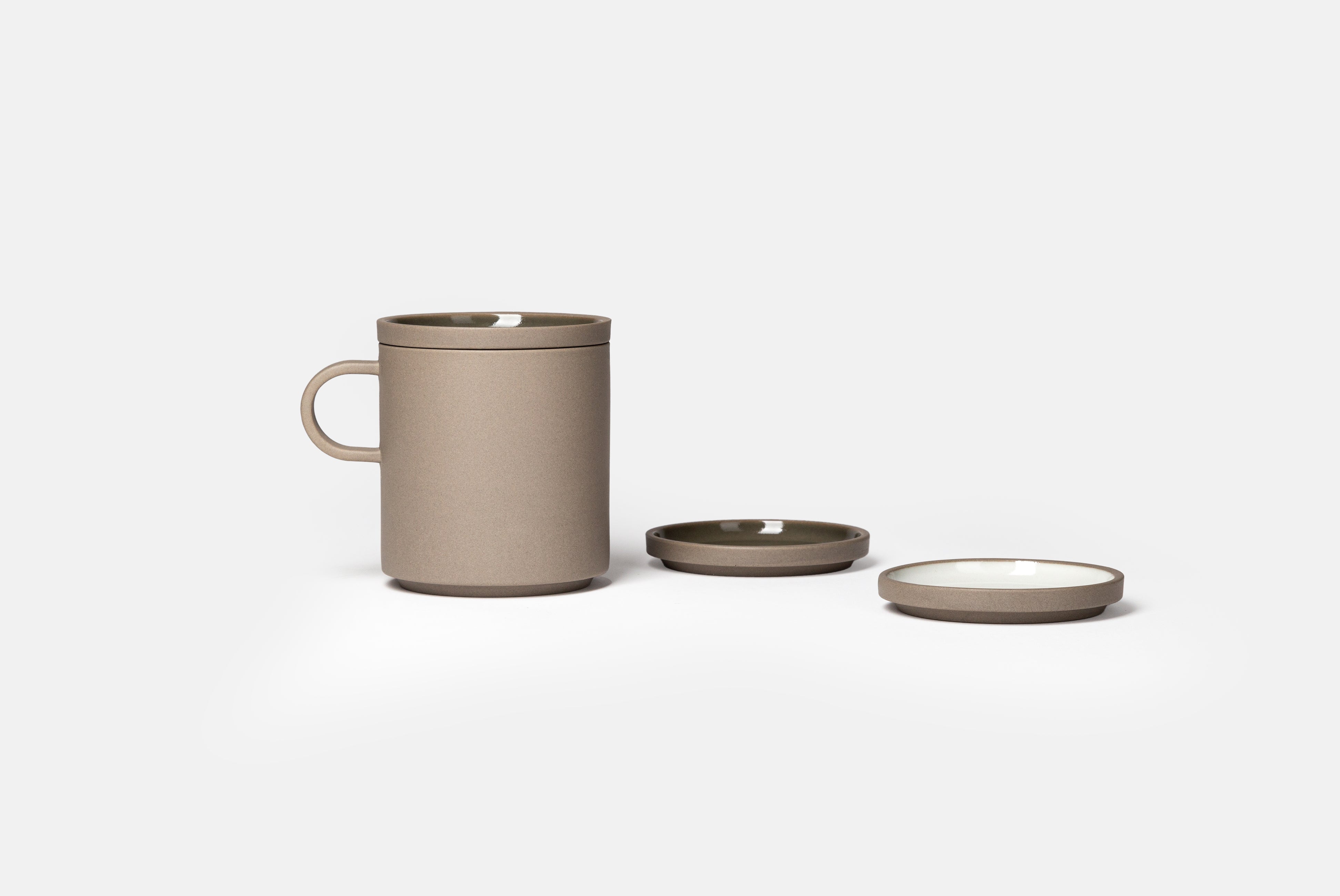 Hasami Small Plate from the new Grey Collection, shown in White Ash and Dark Grey with a mug, on white background