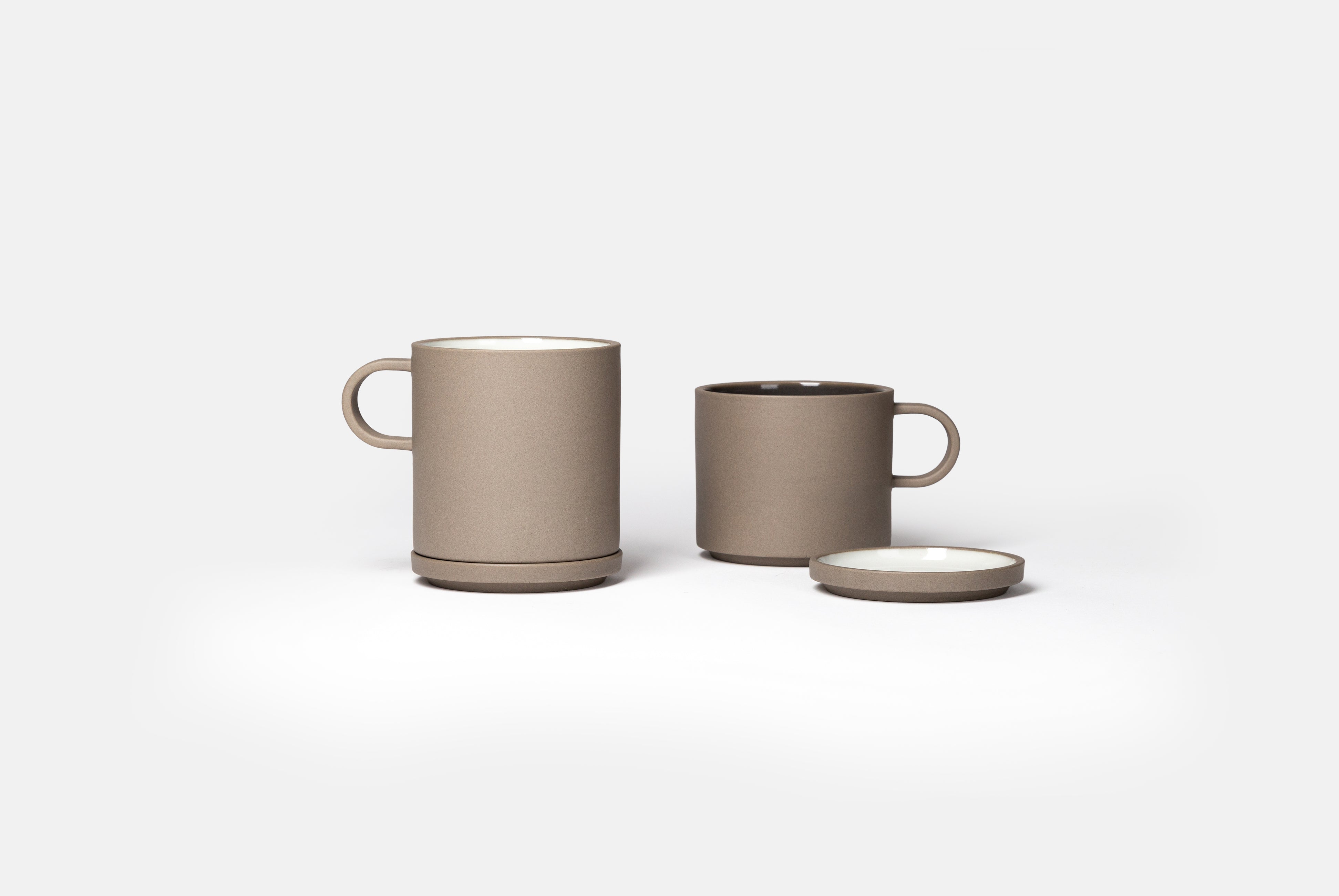 Hasami Small Plate from the new Grey Collection, shown in White Ash and Dark Grey with medium and small mug, on white background