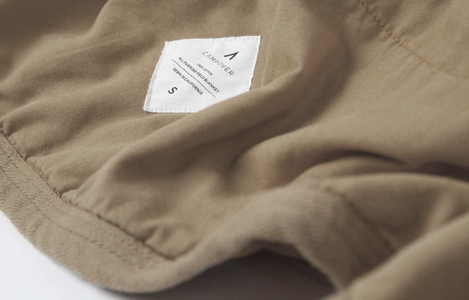 All Purpose Field Blanket in Sand by Campover | Label detail & lifestyle